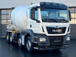 Putzmeister  on chassis MAN 32.430  concrete mixer truck