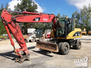 CATERPILLAR M315C wheel excavator