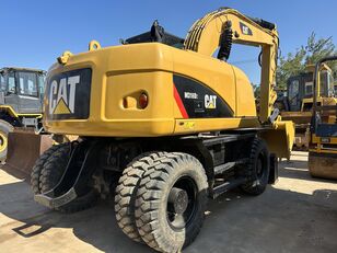 Caterpillar M318 wheel excavator